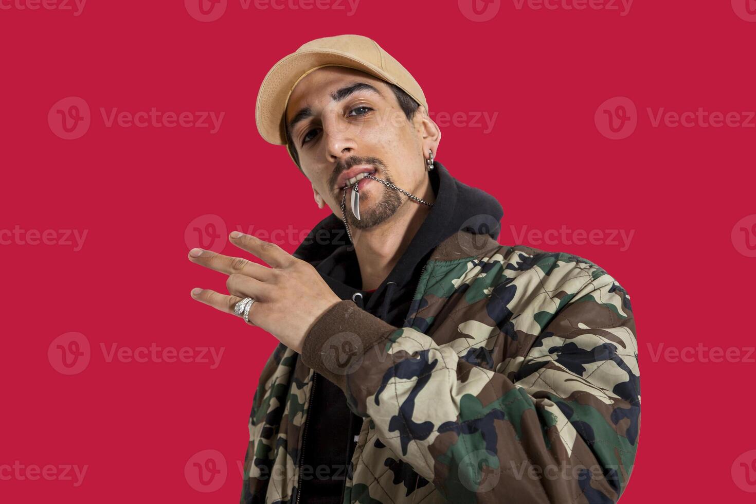 portrait of young rapper in the studio photo