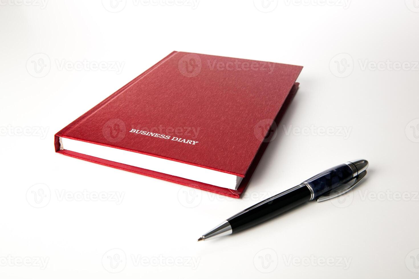 business diary with pen photo
