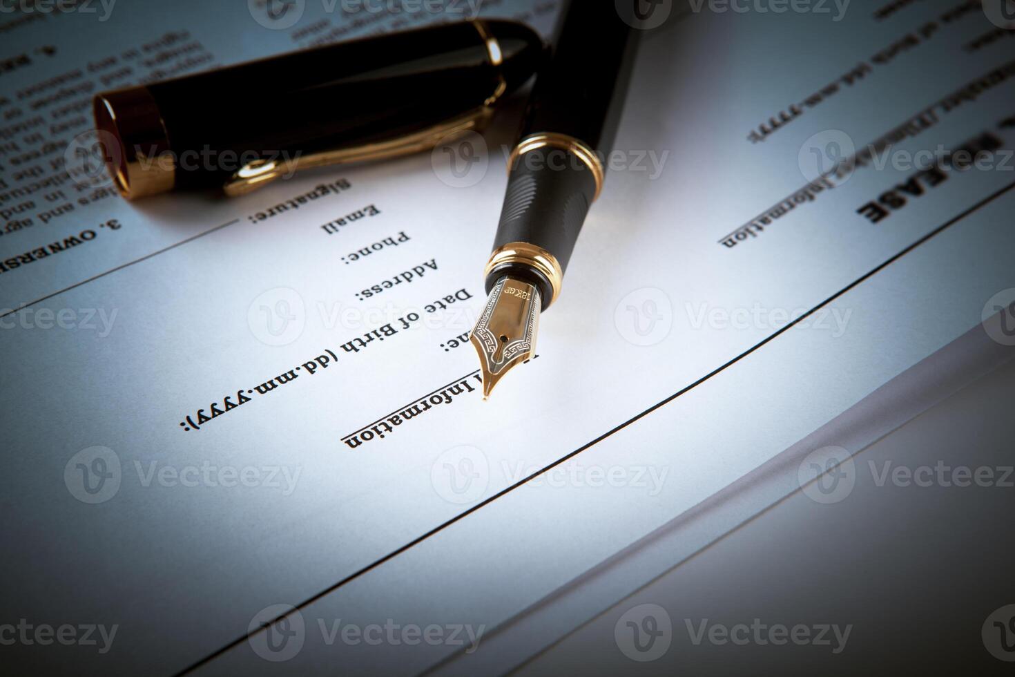 fountain pen on text sheet paper contract photo