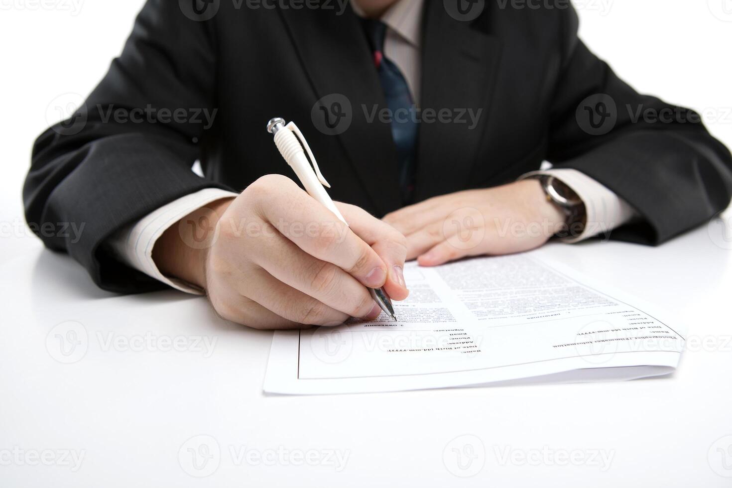 man signing a contract photo