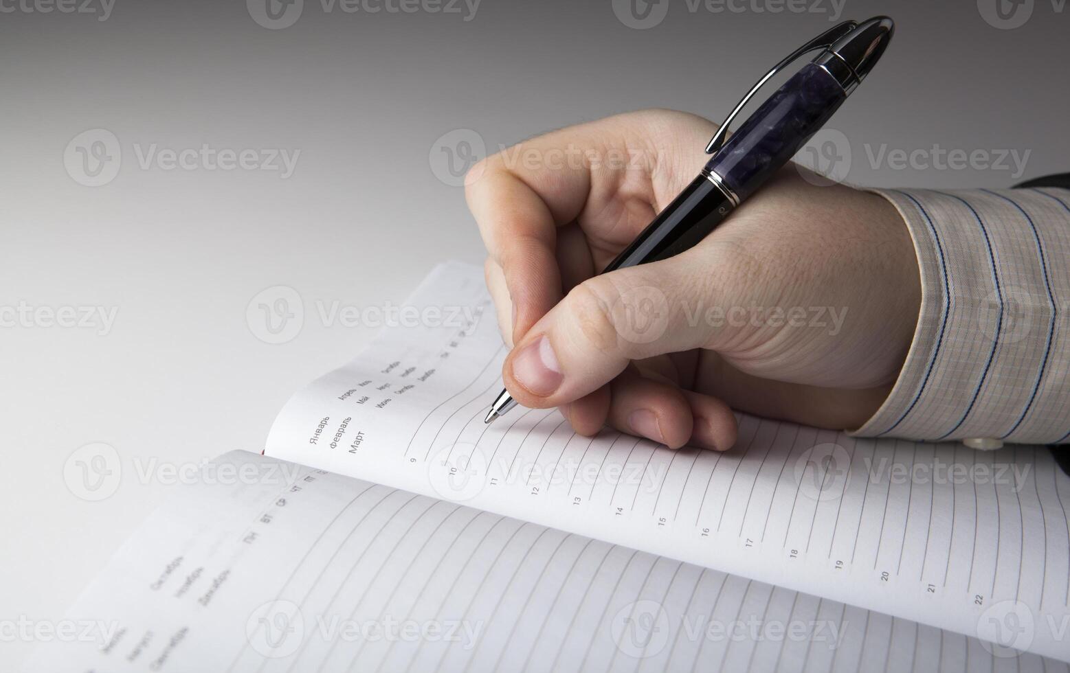 man is preparing for written work photo