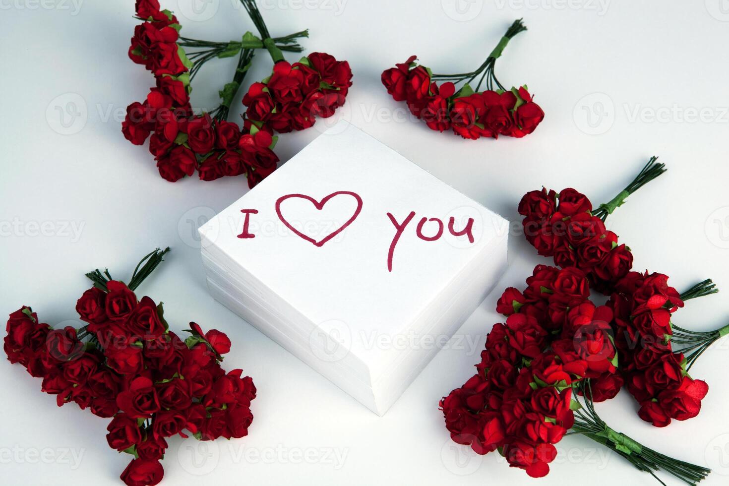 notebook with marker inscription I love you and roses photo