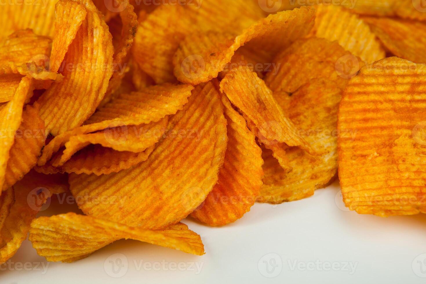 handful of potato chips photo
