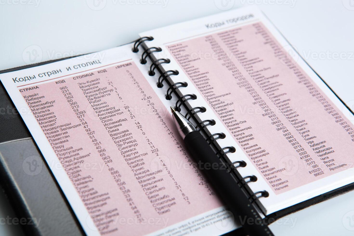 pen on notebook page with text photo