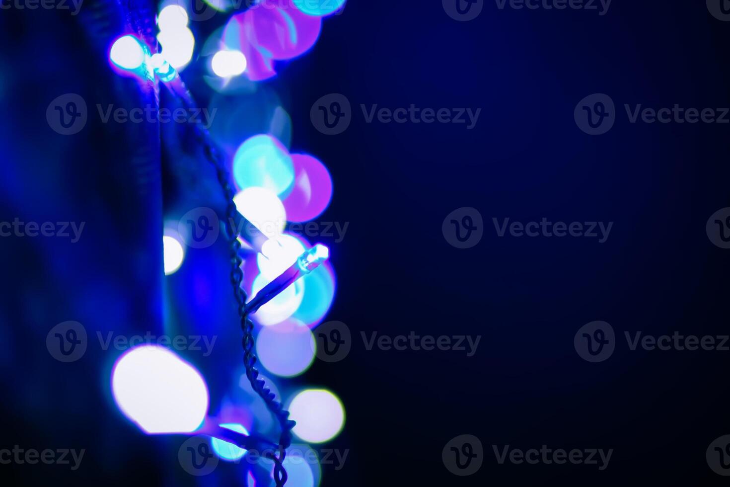 Abstract bokeh background. Blurred garland lights. photo