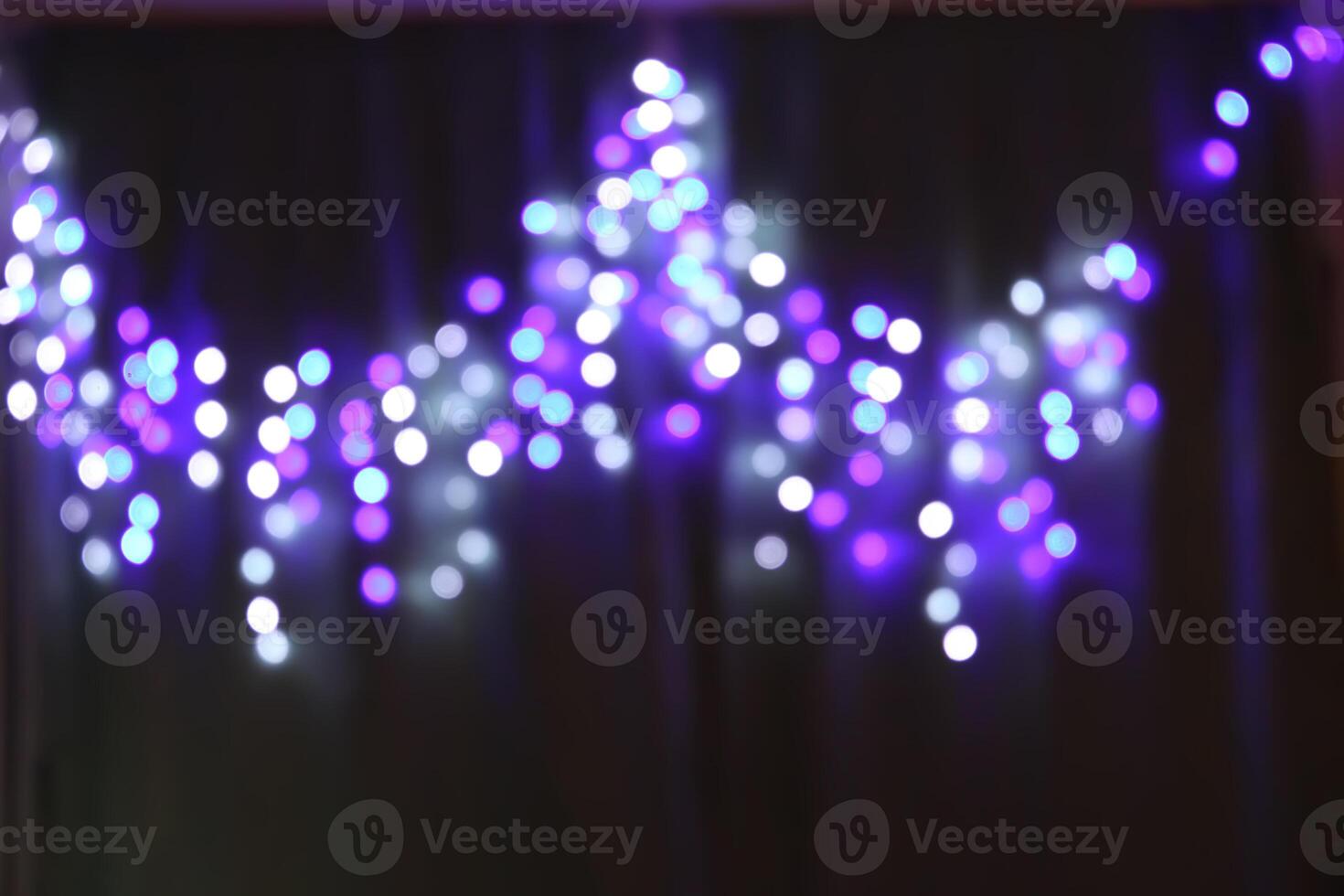 Abstract bokeh background. Blurred garland lights. photo