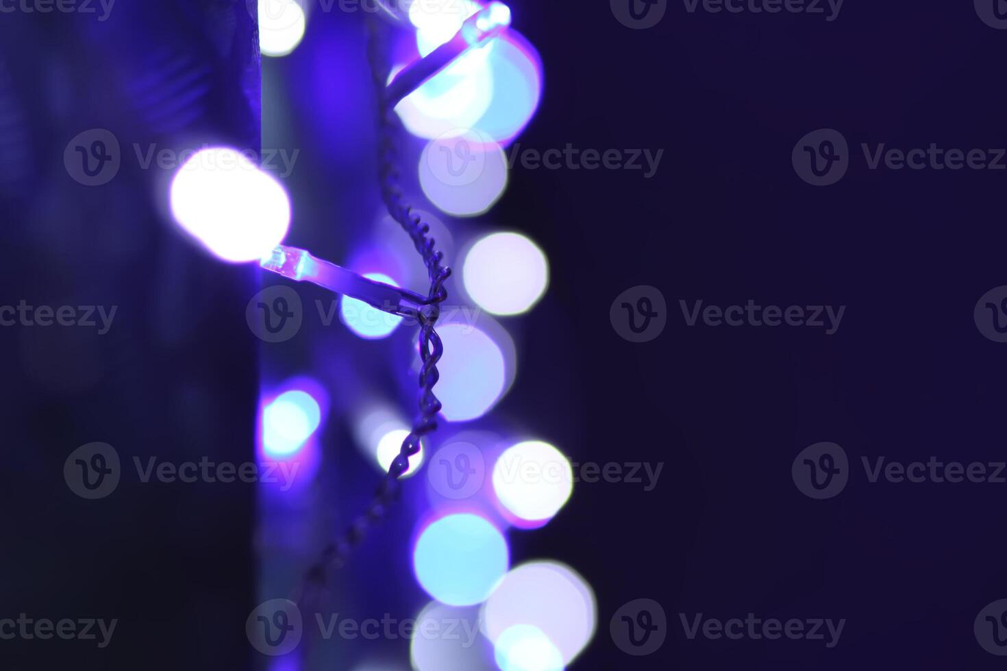 Abstract bokeh background. Blurred garland lights. photo