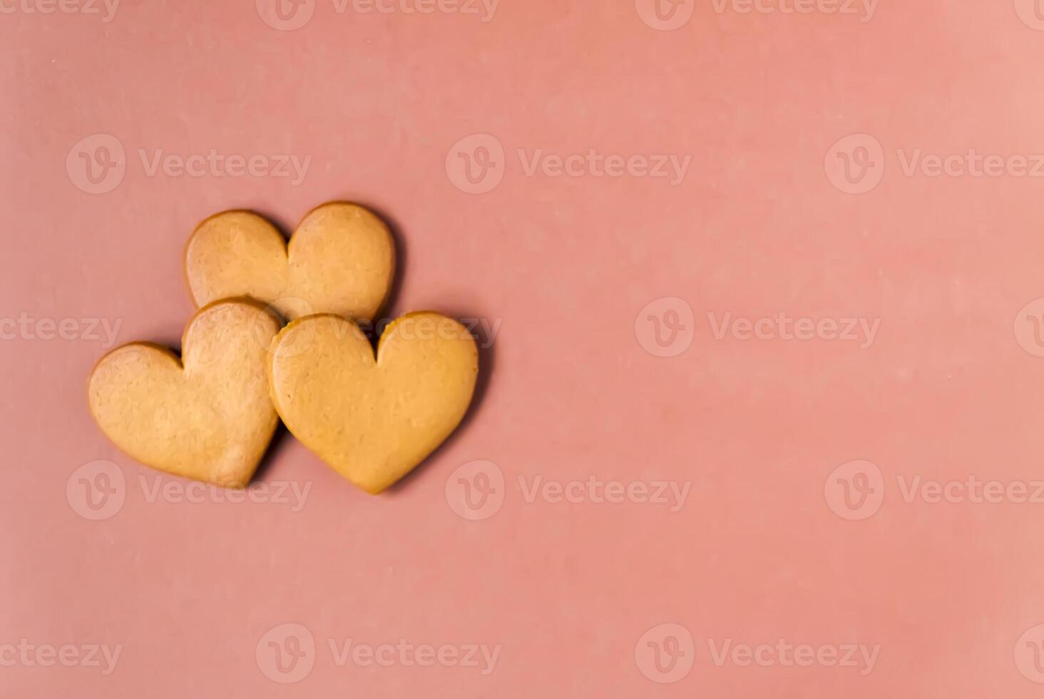 Gingerbread heart on colorful background. Valentine's day symbol. photo