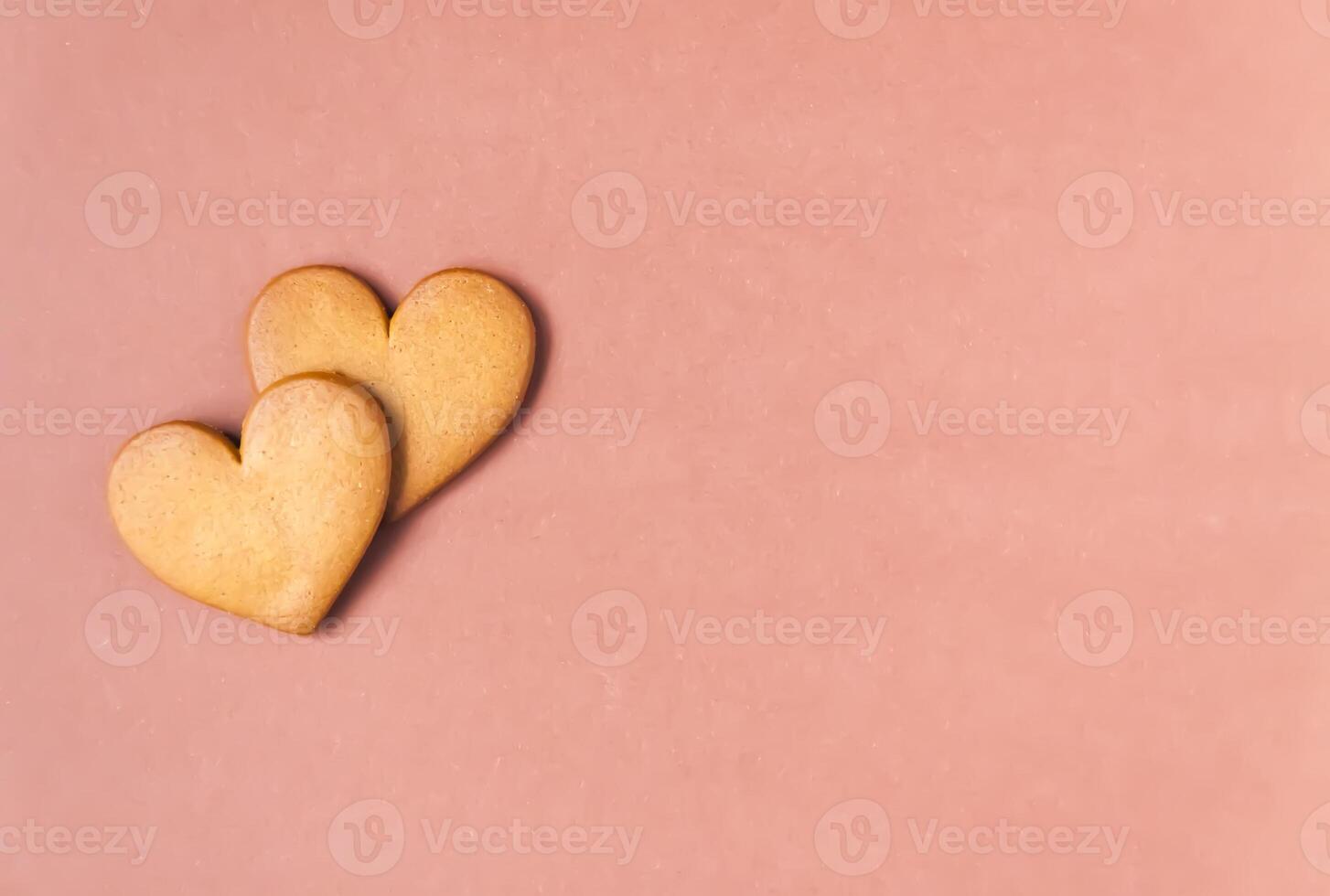 Gingerbread heart on colorful background. Valentine's day symbol. photo