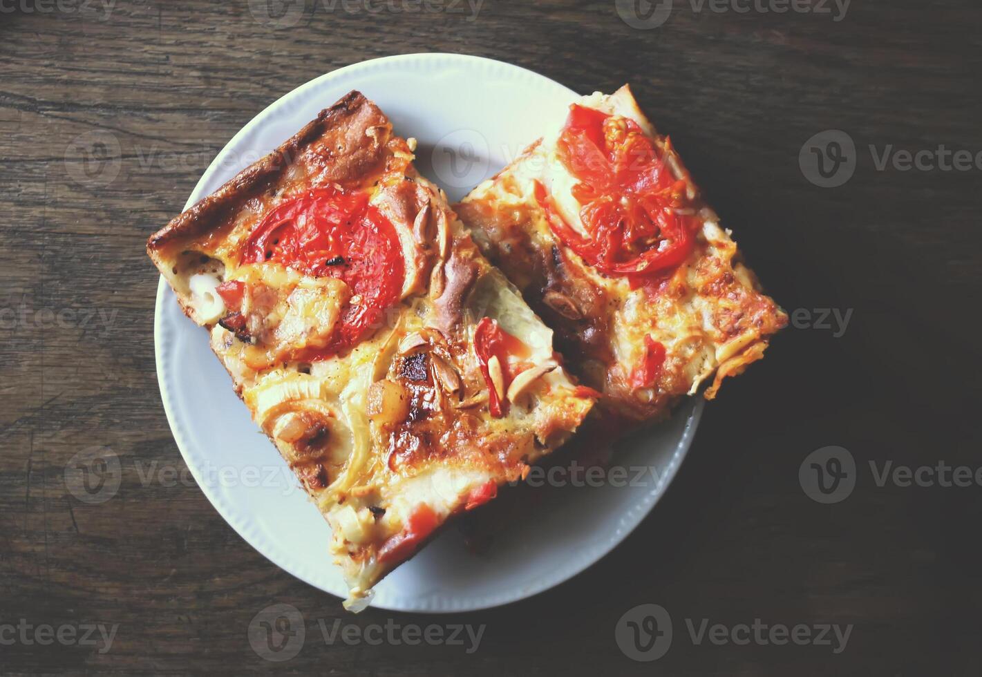 Rustic pizza with tomatoes photo