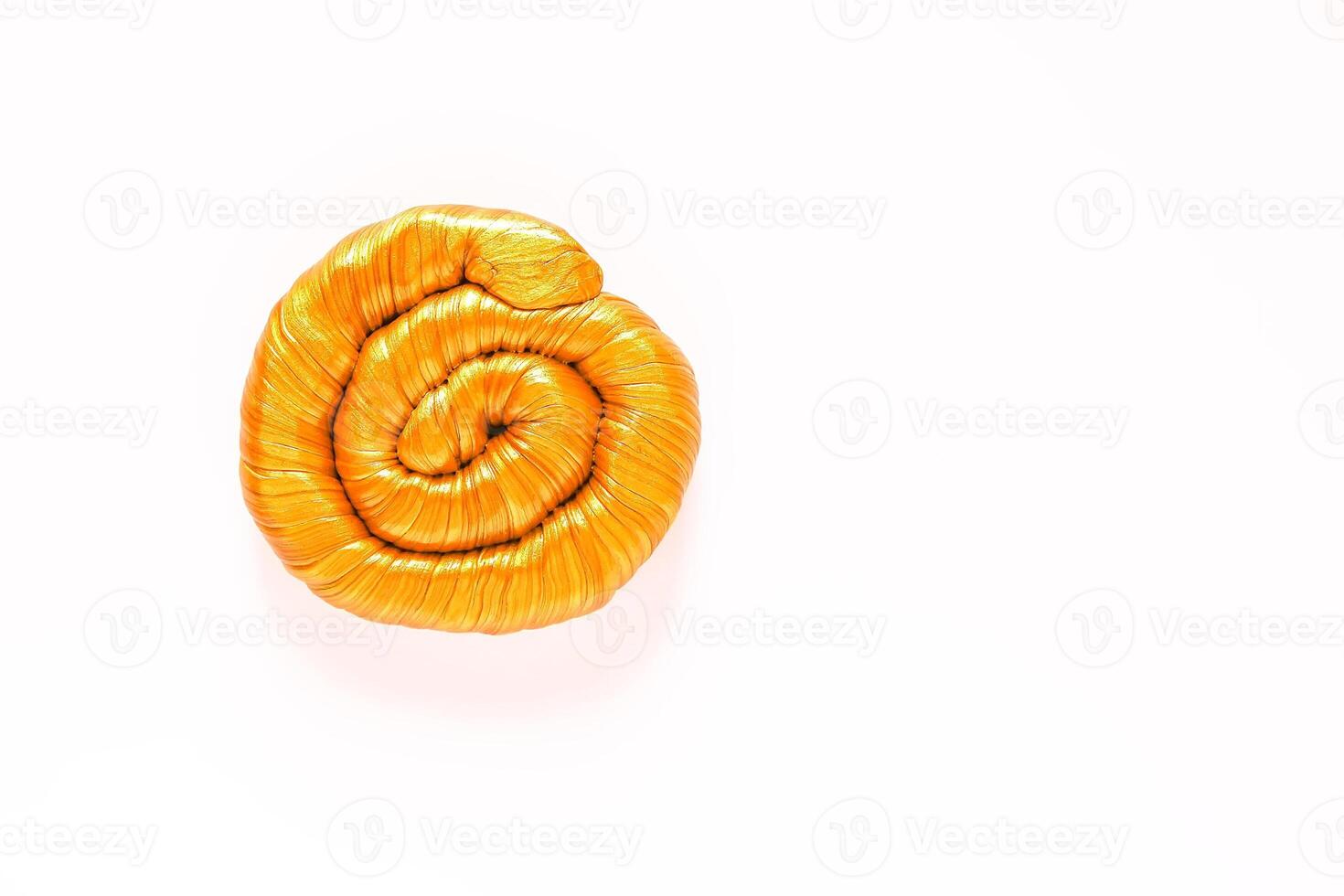 The pasticine texture. Golden mass for kids activity, toys, handmade, anti-stress. photo