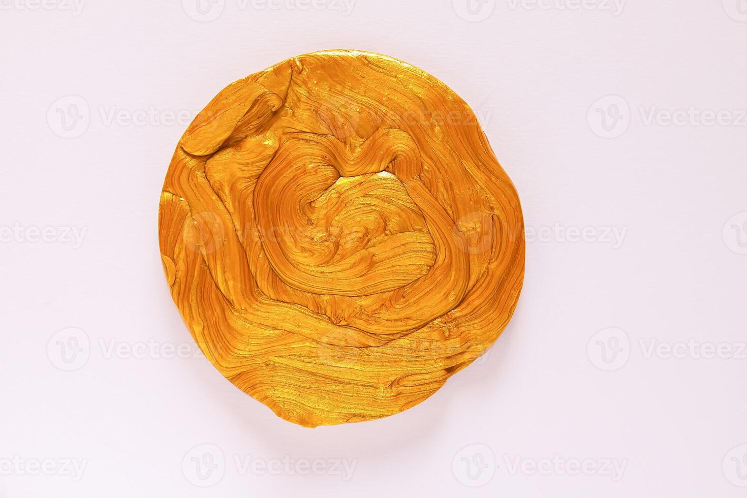 The pasticine texture. Golden mass for kids activity, toys, handmade, anti-stress. photo