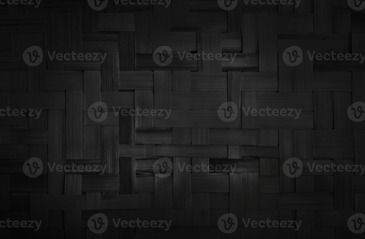 Black Bamboo Weave Pattern on Rattan Mat - Textured Background for Design photo