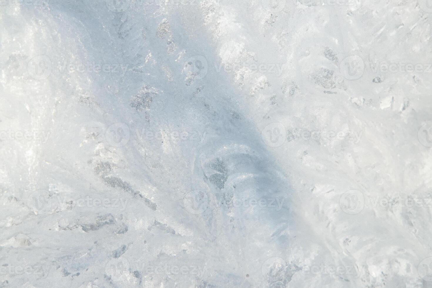 Winter Ice with Tree Shadow on Frozen Glass - Full Frame Texture photo