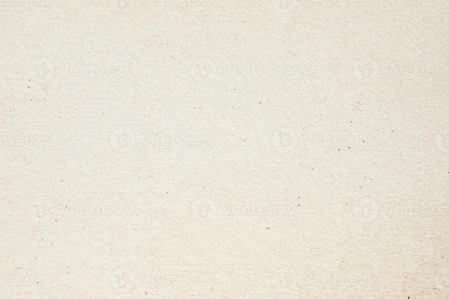 Textured Beige Paper with Grainy Surface photo