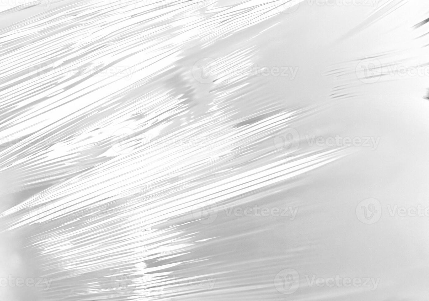 Close-up of Stretched Transparent Plastic Wrap Texture photo