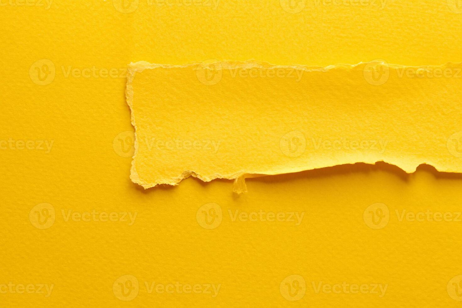 Abstract Art Collage of Torn Paper and Sticky Notes in Yellow Tones photo