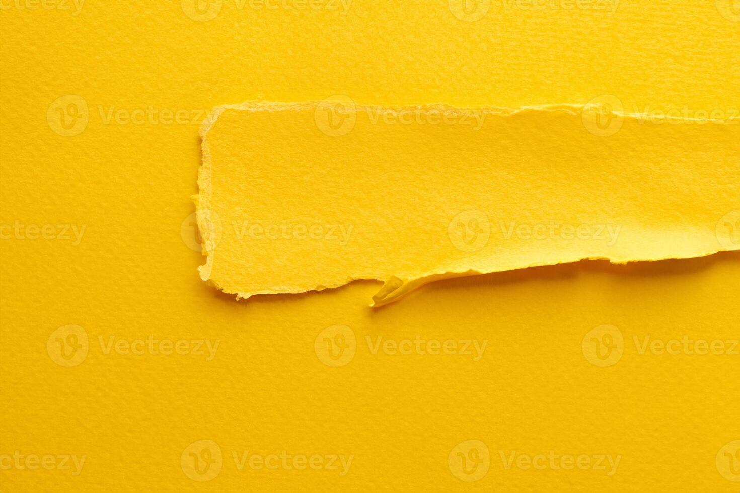 Abstract Art Collage of Torn Paper and Sticky Notes in Yellow Tones photo
