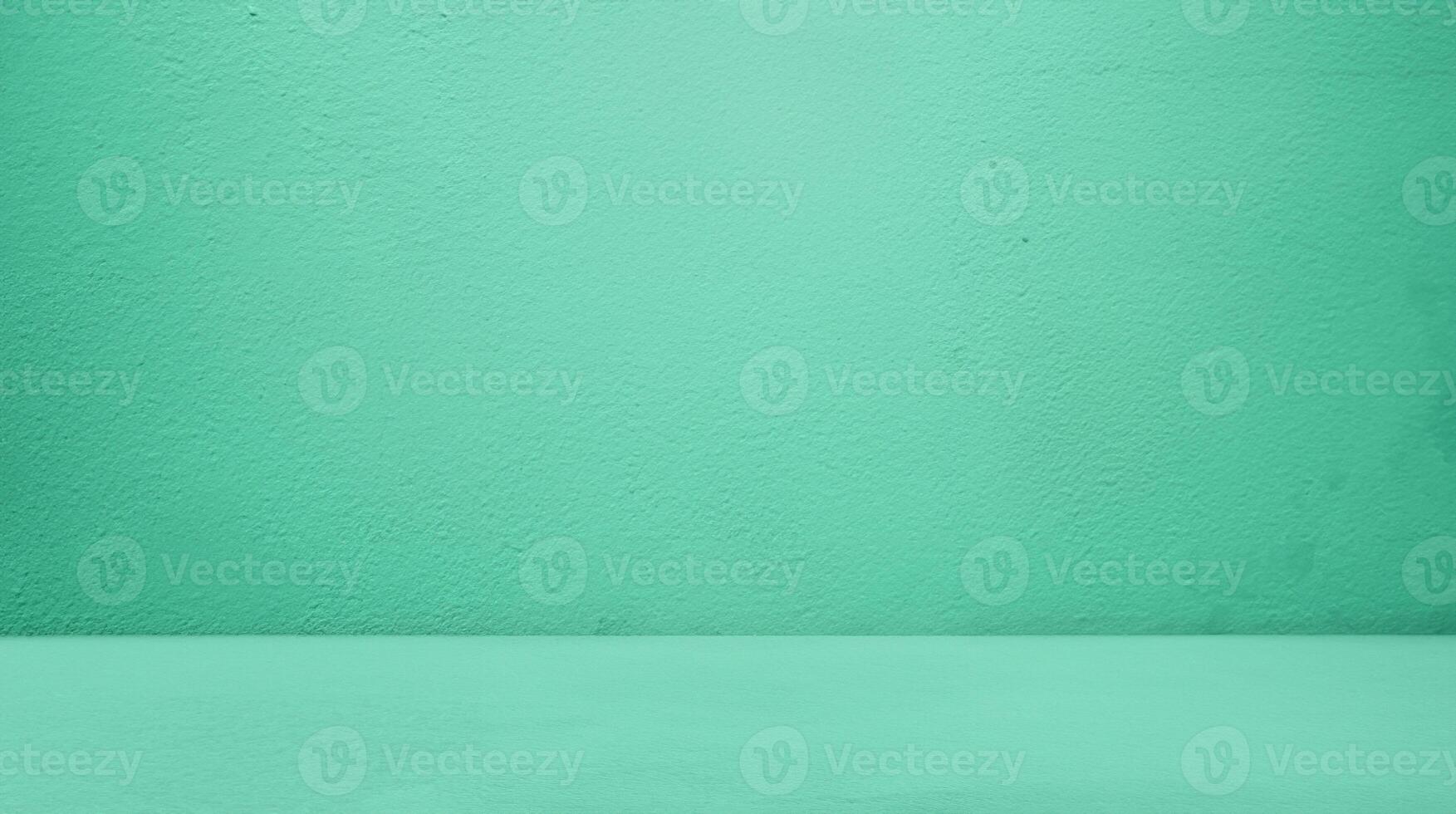 Minimalist Green Studio with Concrete Table and Gradient Background - Perfect for Product Display or Cosmetic Presentation photo
