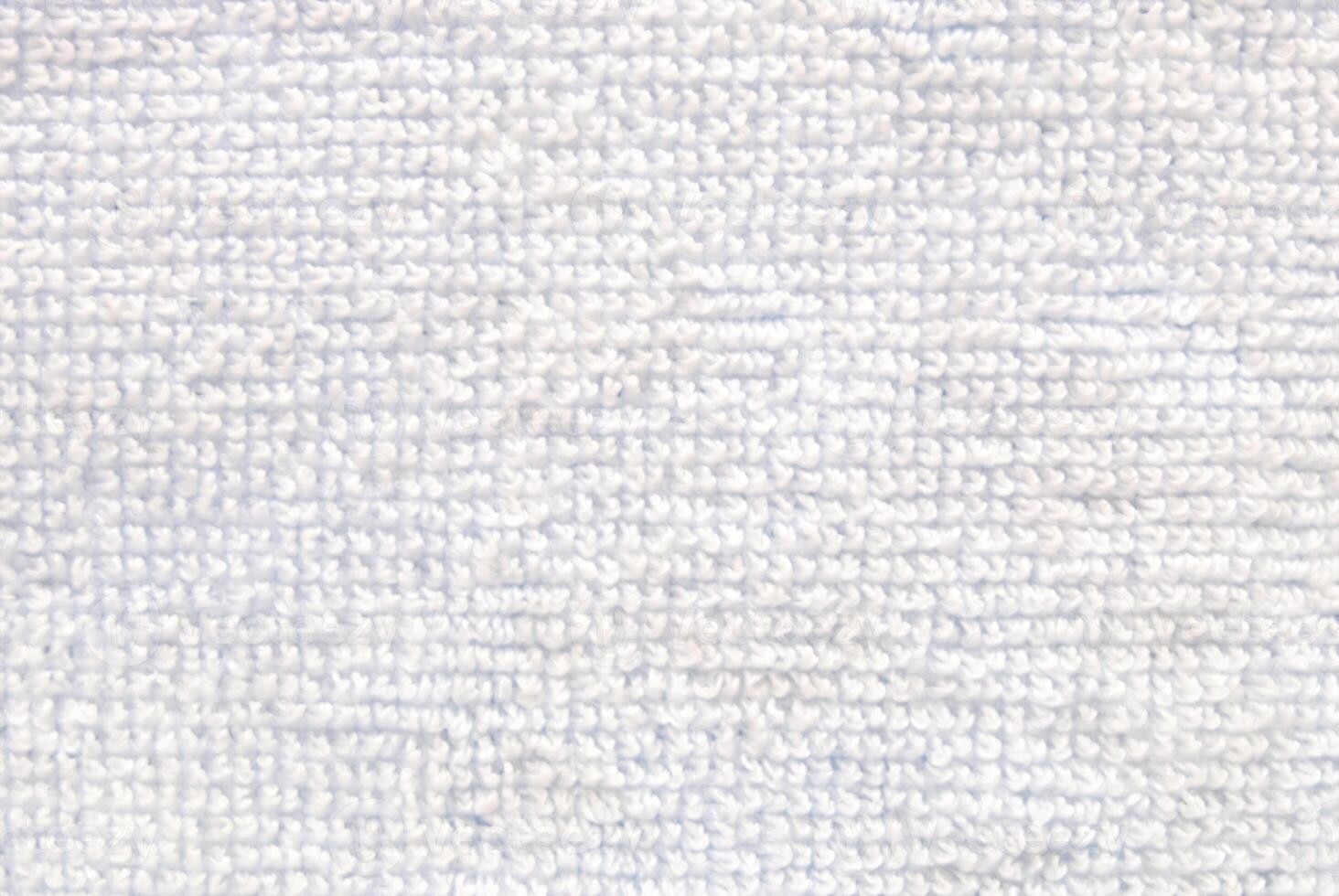 Close-Up of Soft White Towel Fabric Texture Background photo