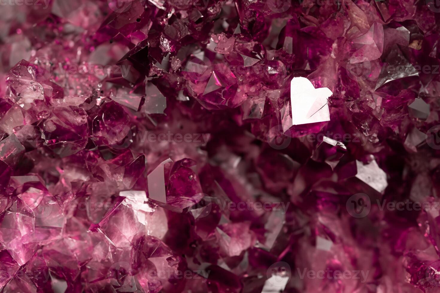 Amethyst Garnet Crystals in Natural Setting - Burgundy Gemstone Texture and Shiny Surface photo