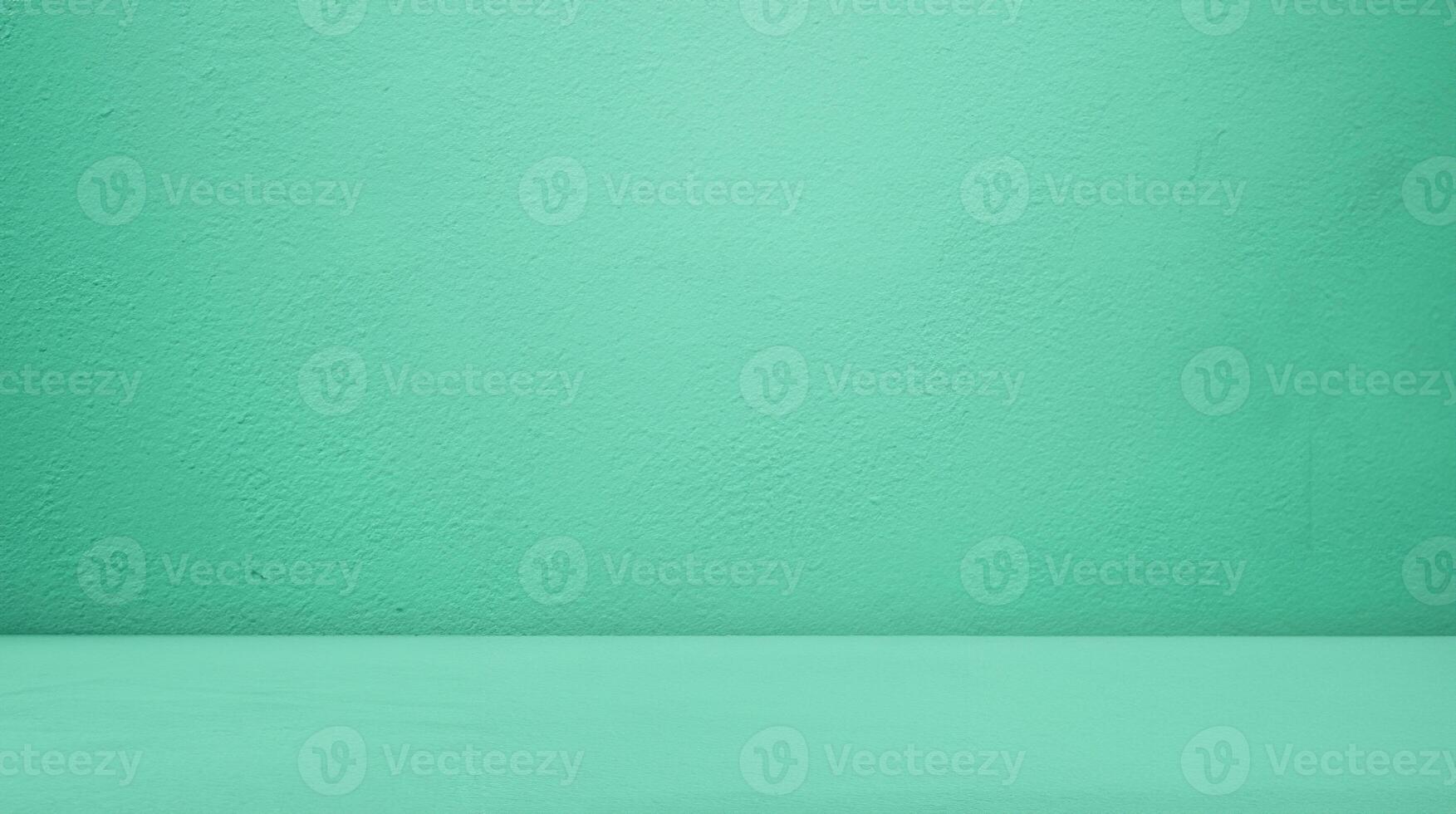 Minimalist Green Studio with Concrete Table and Gradient Background - Perfect for Product Display or Cosmetic Presentation photo