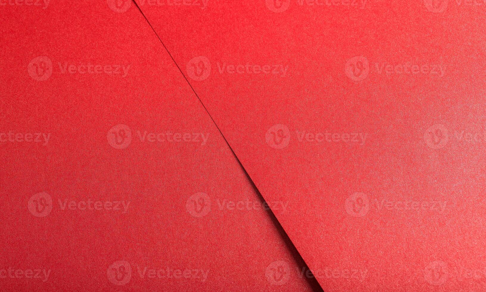 Red scarlet color paper background, smooth glowing shining texture, backdrop photo