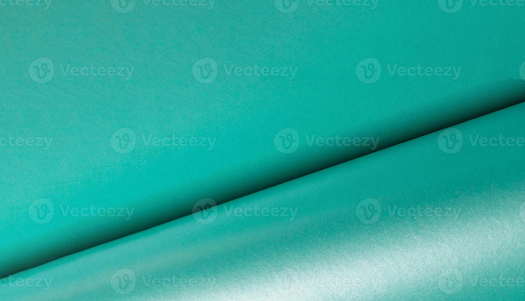 Turquoise color paper background, smooth glowing shining texture, backdrop photo