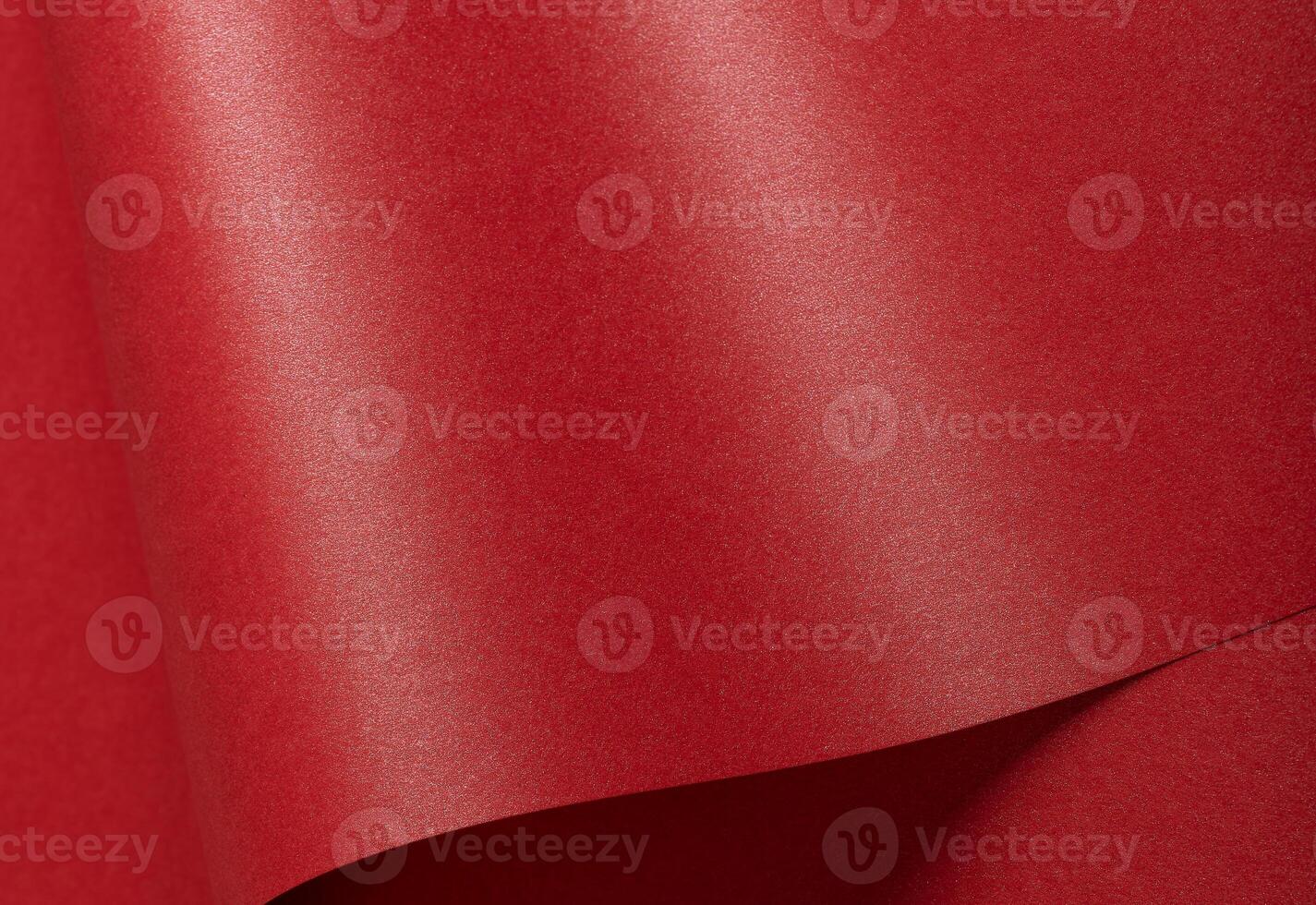 Red scarlet color paper background, smooth glowing shining texture, wave photo