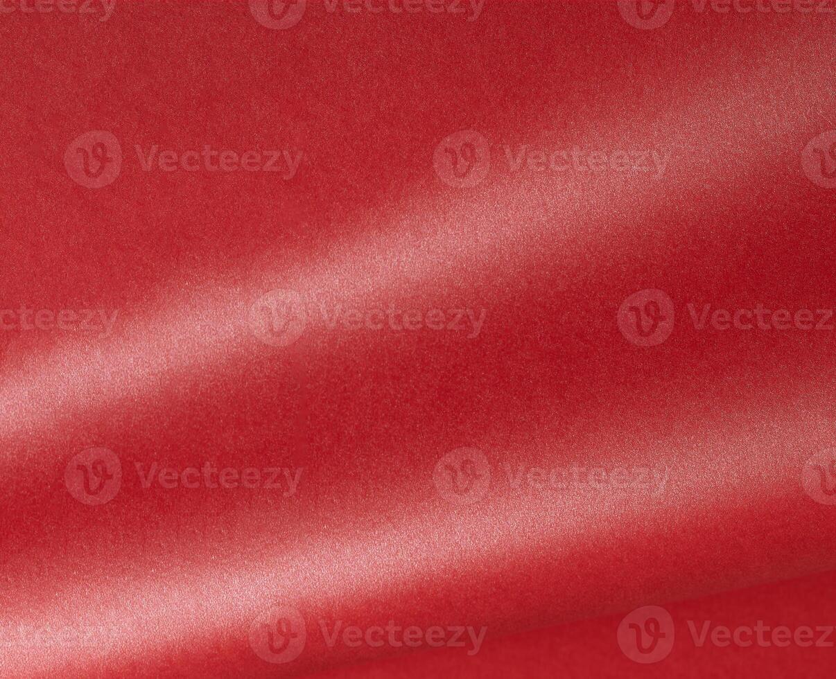 Red scarlet color paper background, smooth glowing shining texture, light gradient photo