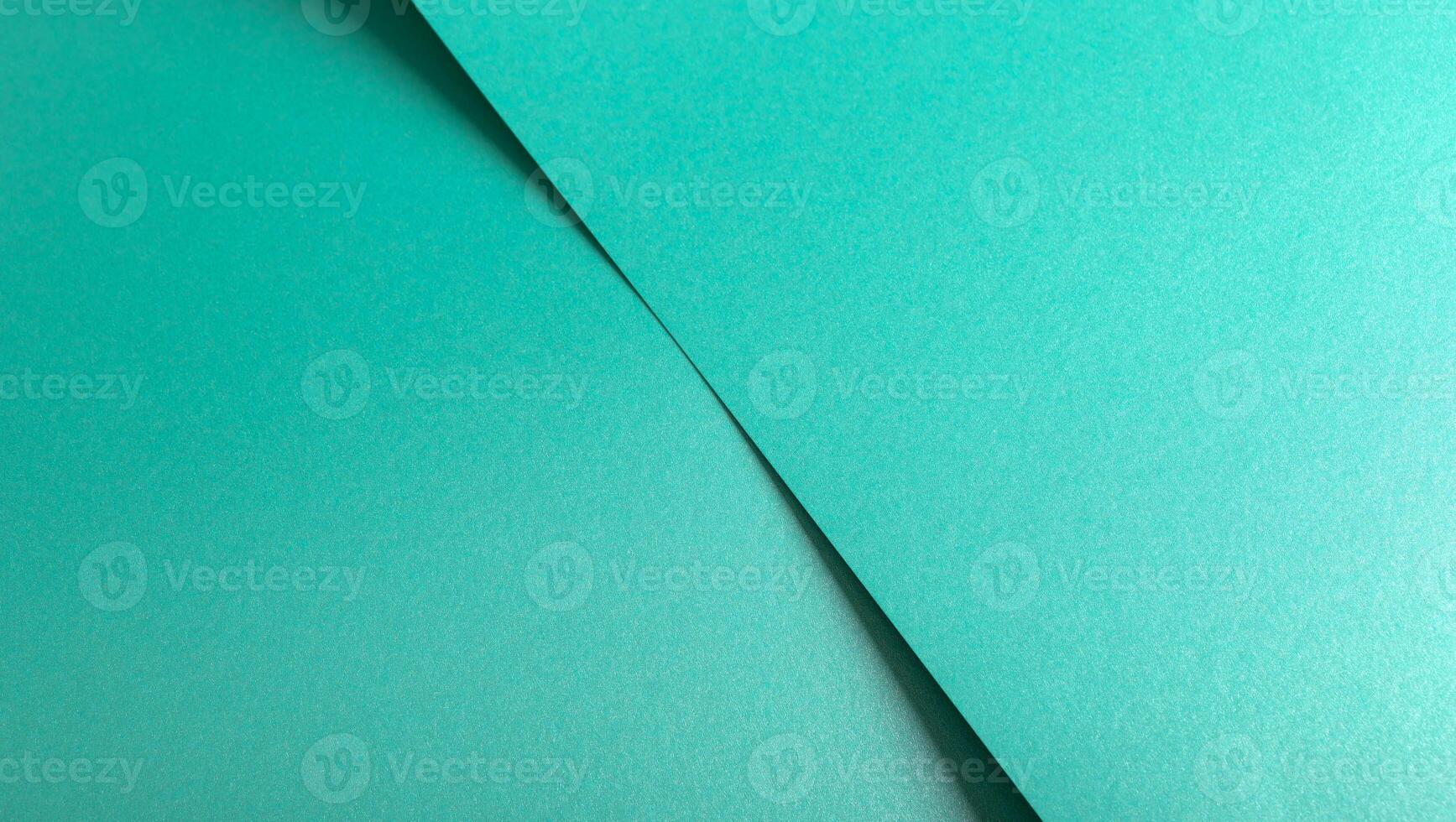 Turquoise color paper background, smooth glowing shining texture photo