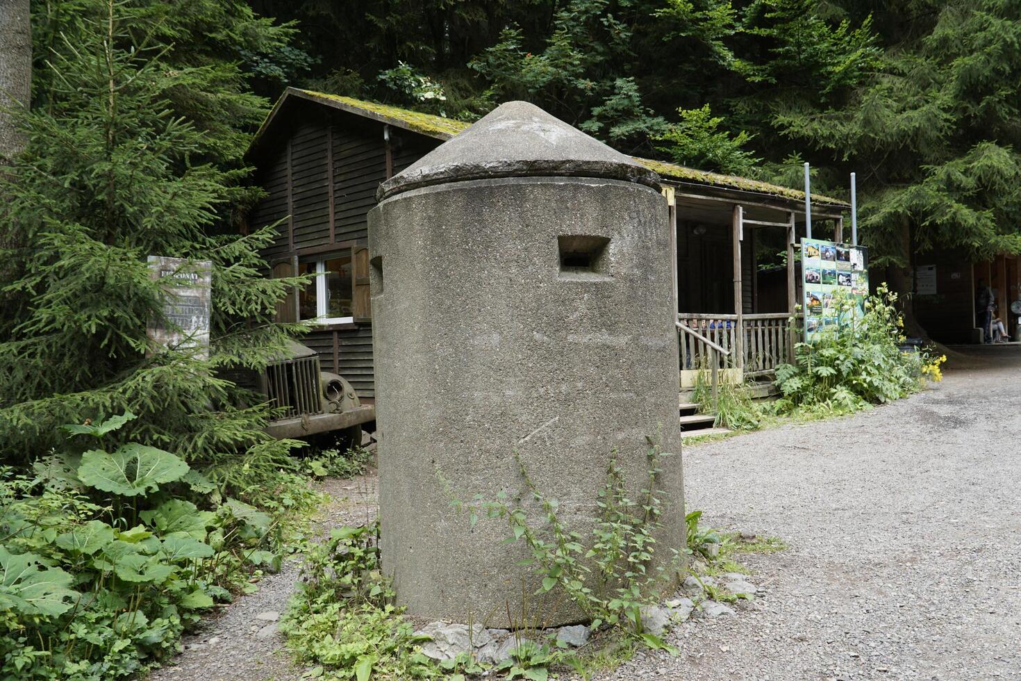 Osowka, Gluszyca, Poland - August 06th, 2024 - Concrete guard booth at entrance to underground tunnels photo