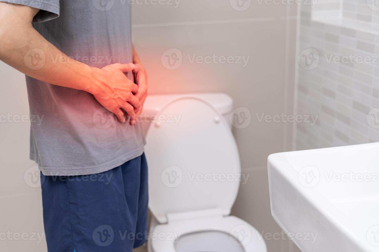 Constipation and diarrhea in bathroom. Hurt man touch belly stomach ache painful. colon inflammation problem, toxic food, abdominal pain, abdomen, constipated in toilet, stomachache, Hygiene photo