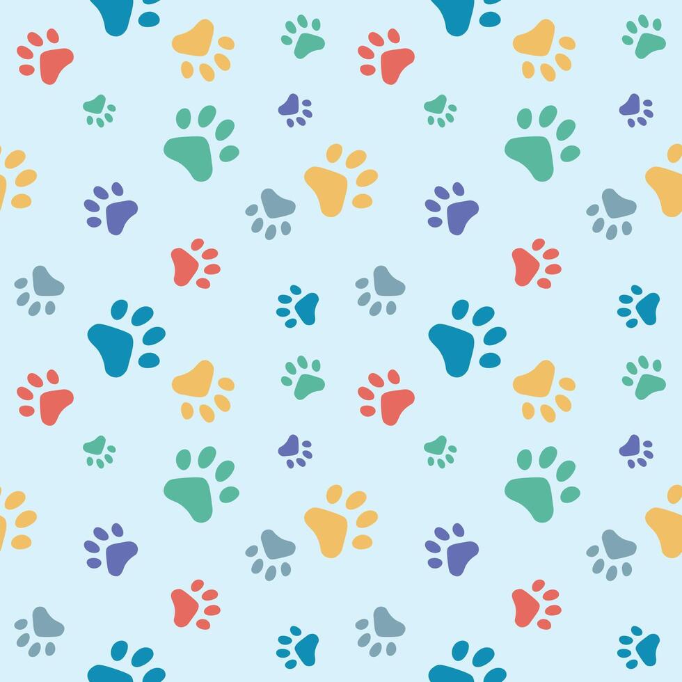 Seamless pattern with cat paw prints vector