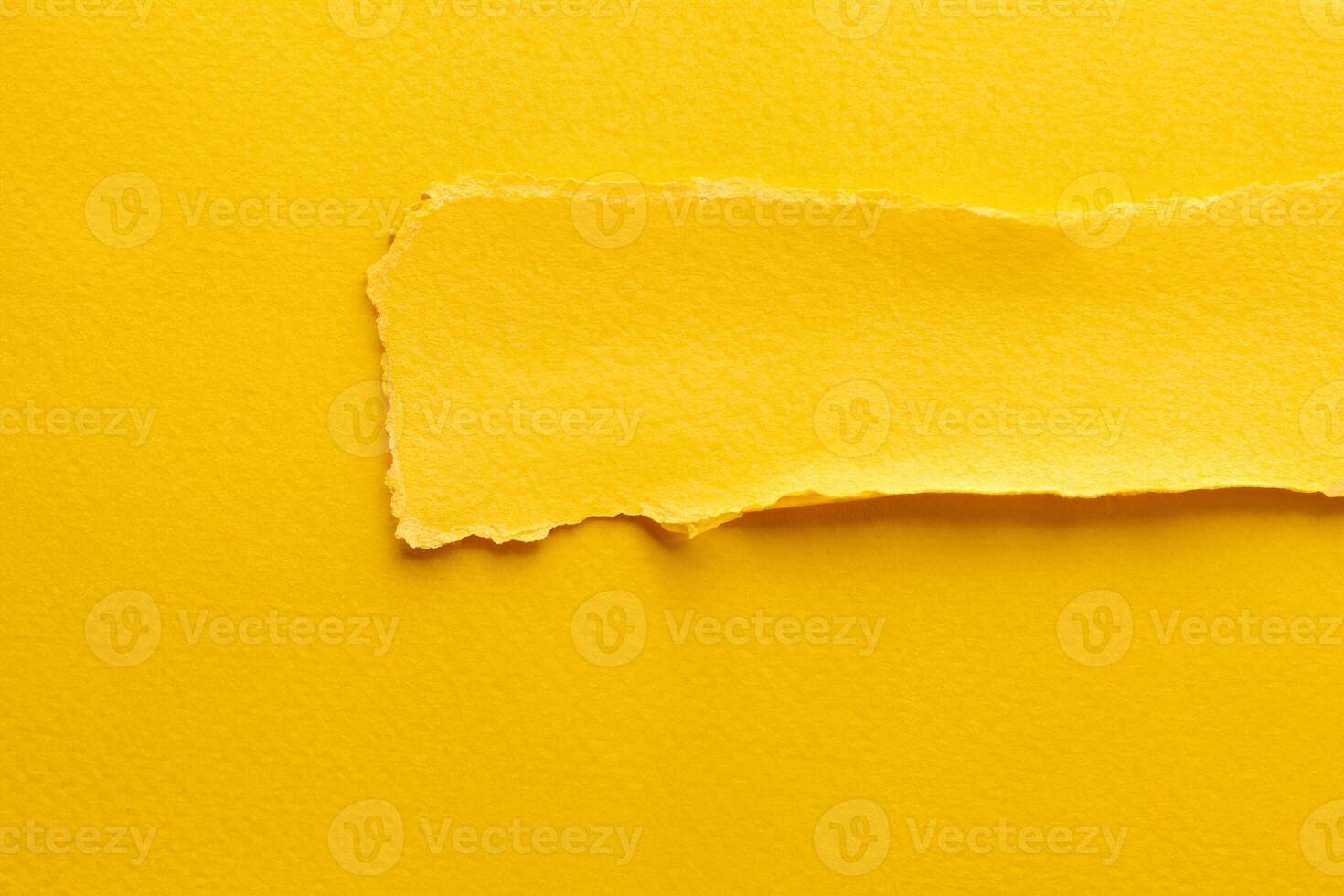 Abstract Art Collage of Torn Paper and Sticky Notes in Yellow Tones photo
