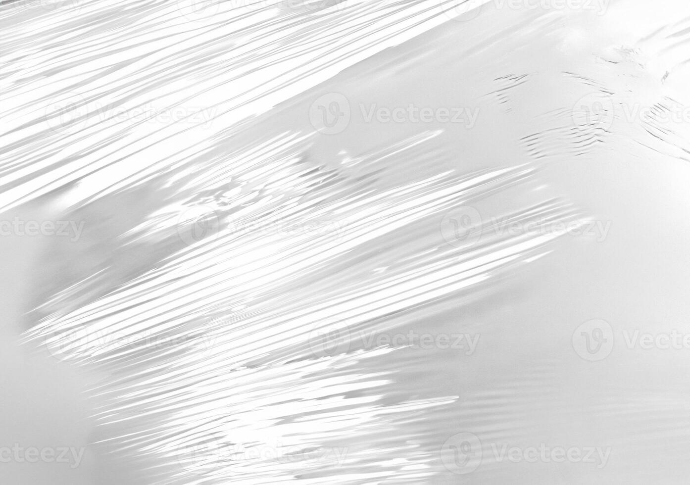Close-up of Stretched Transparent Plastic Wrap Texture photo