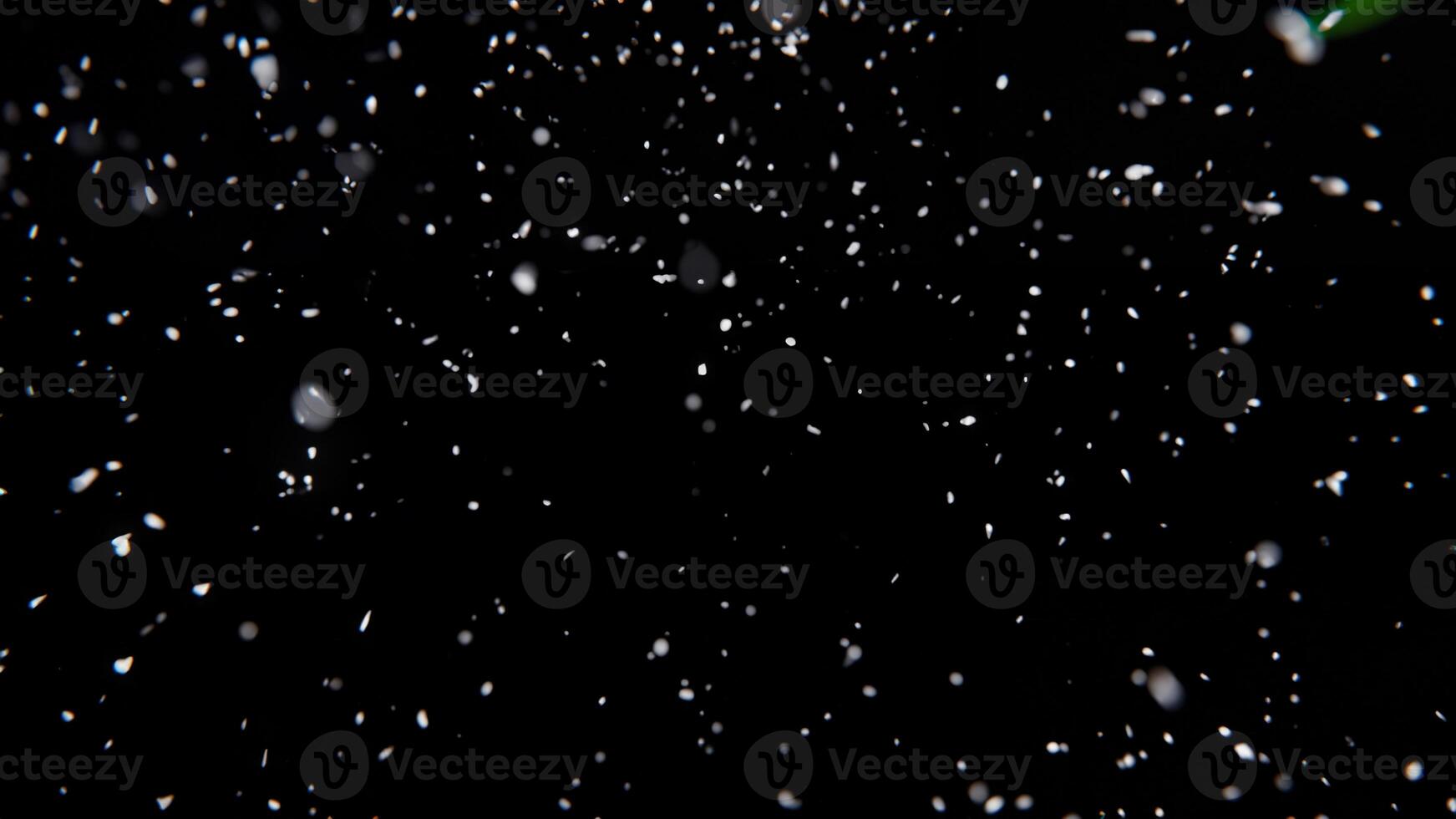 Snowfall on Black Background with Blurred Snowflakes - 3D Render photo
