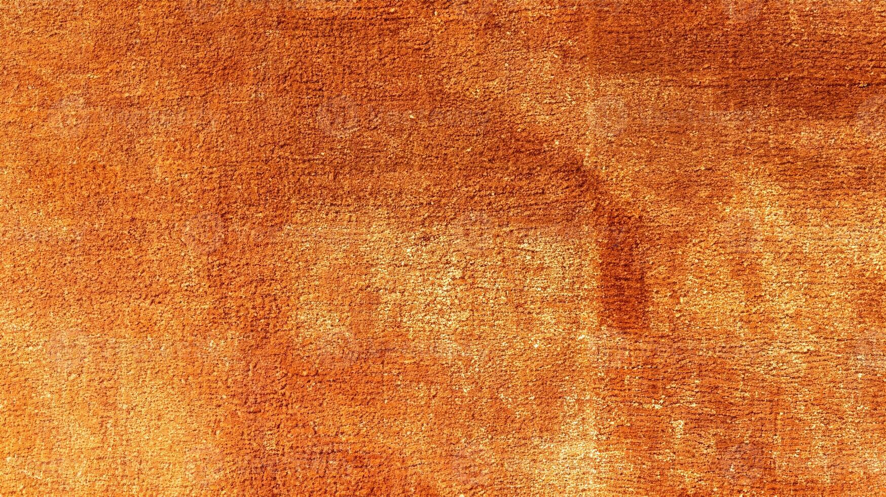 Blank Canvas on Peach-Brown Carpet Background photo
