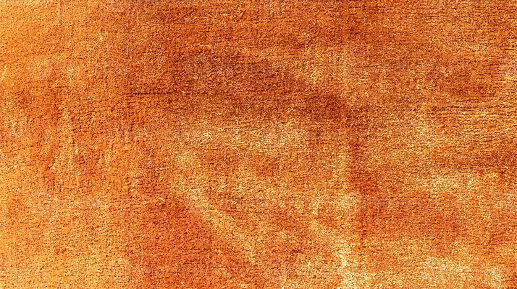 Blank Canvas on Peach-Brown Carpet Background photo