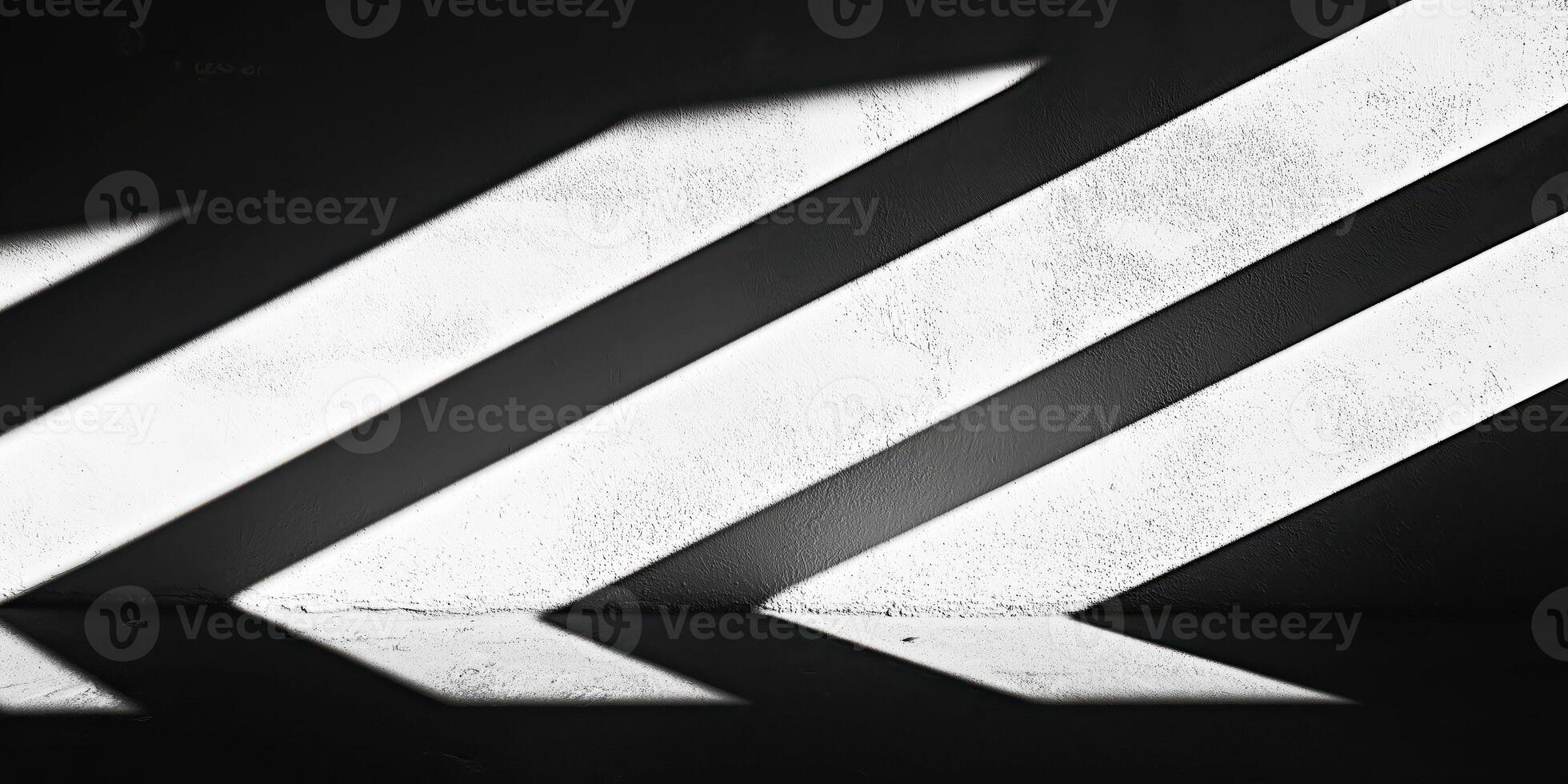 Abstract shadows and light on a textured wall - minimalist black and white design photography photo