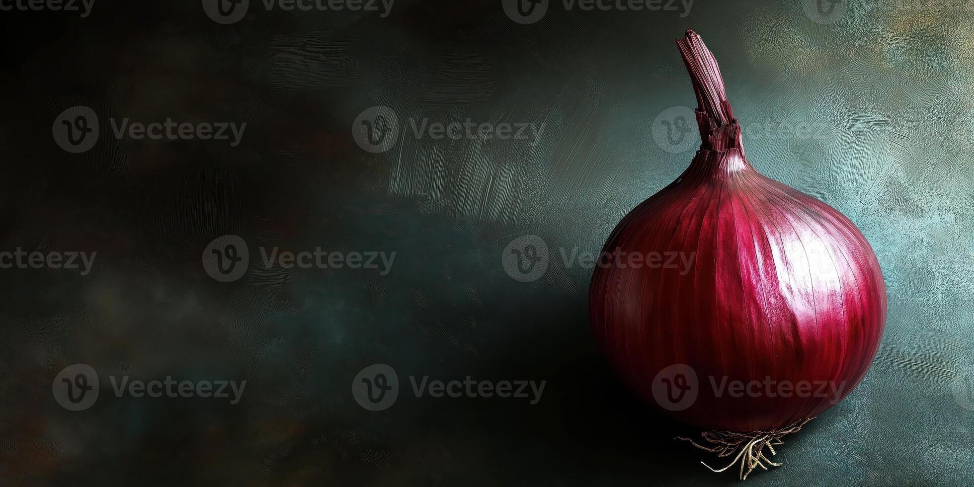 Moody red onion against dark rustic background with dramatic shadows photo