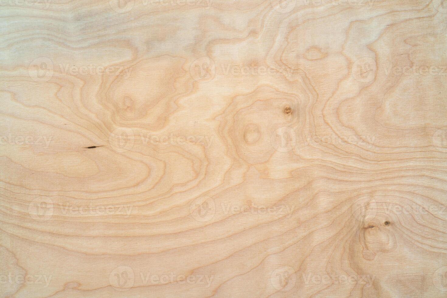 Light plywood texture. Patterned wooden background. Wood product. photo