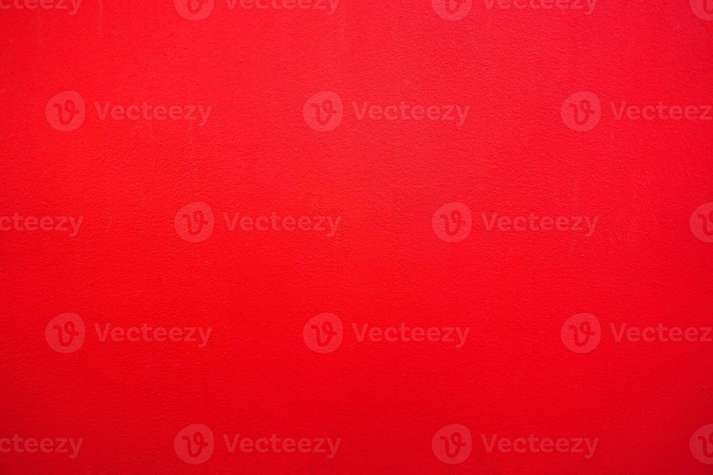 Abstract red background. Red stucco texture. Red rough surface. photo