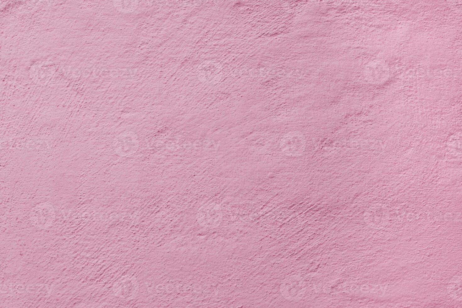 Pink stucco texture. Architectural abstract background. Pink wall of building. photo