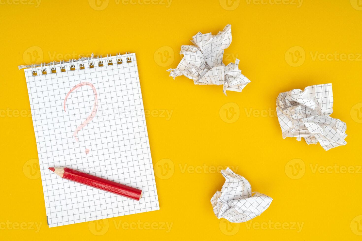 Pencil, notebook and crumpled sheets of paper. photo