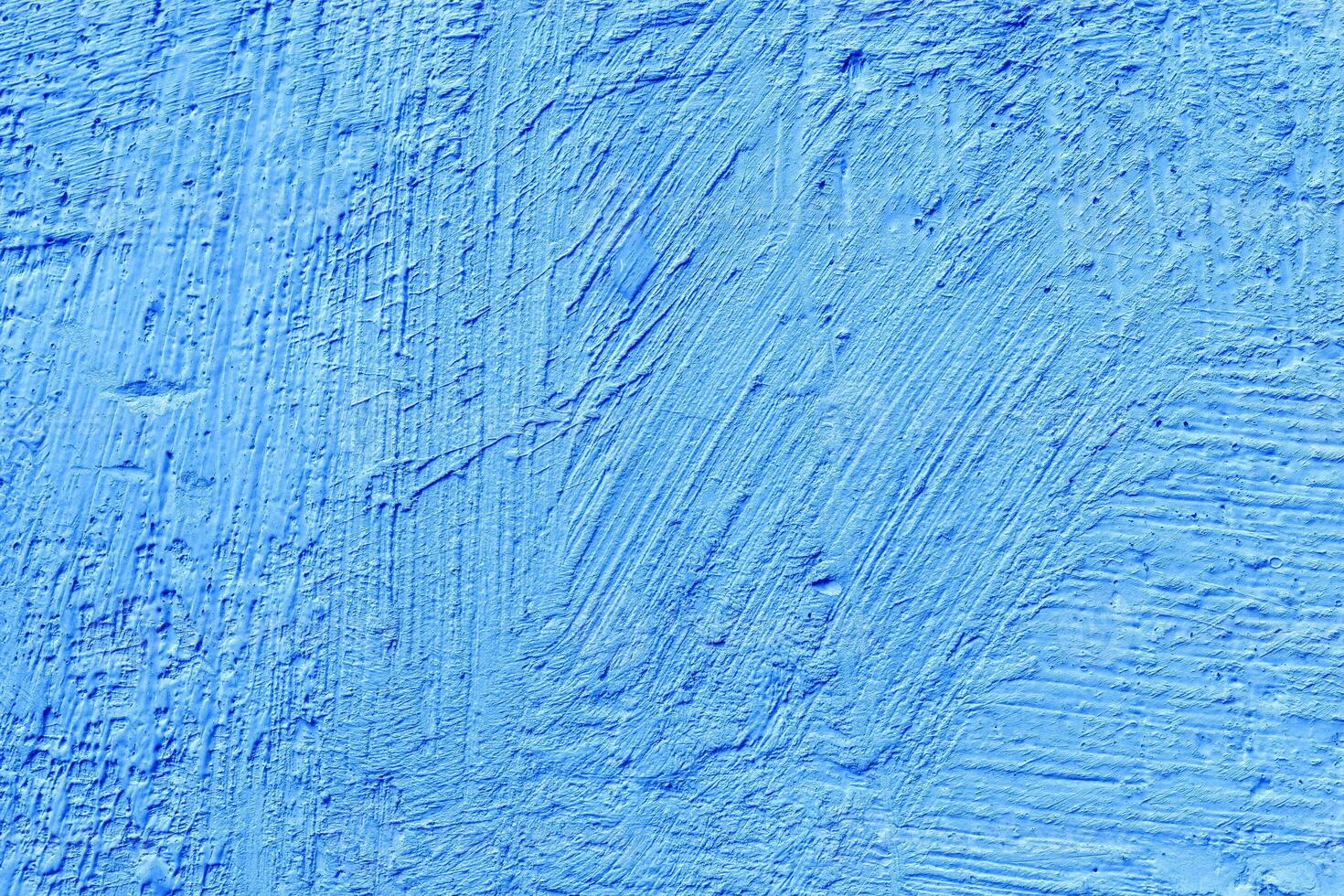 Blue stucco texture. Architectural abstract background. Blue wall of building. photo