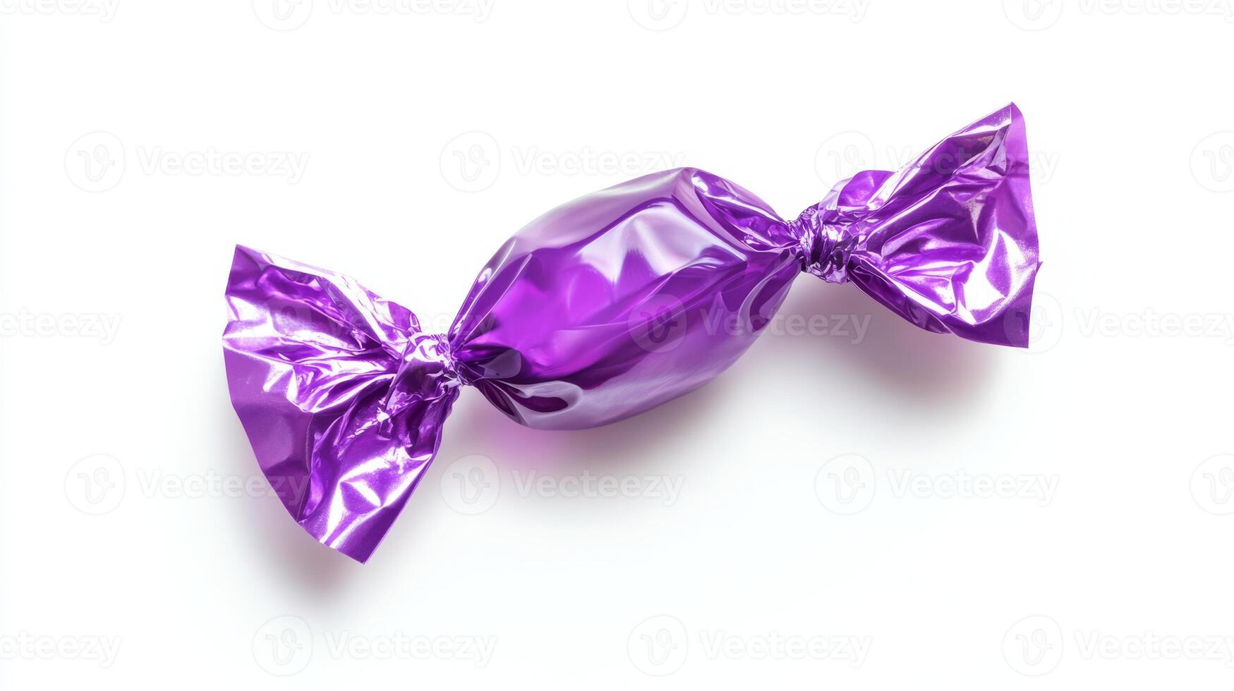 A vibrant purple candy wrapped in shiny foil, perfect for festive parties and celebrations. Its captivating color adds sweetness and fun, making it an irresistible delight for everyone photo