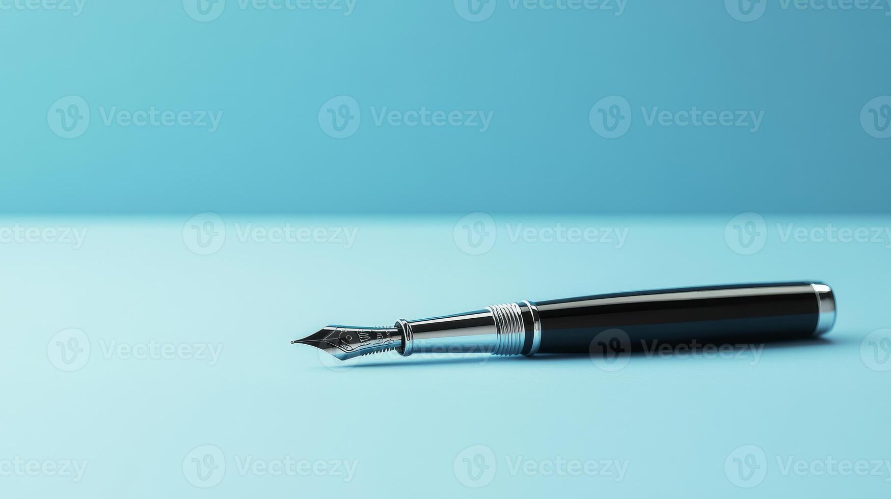 A sophisticated fountain pen, elegantly designed, rests on a rich blue surface, symbolizing creativity and inspiration for business ideas, notetaking, and brainstorming activities photo