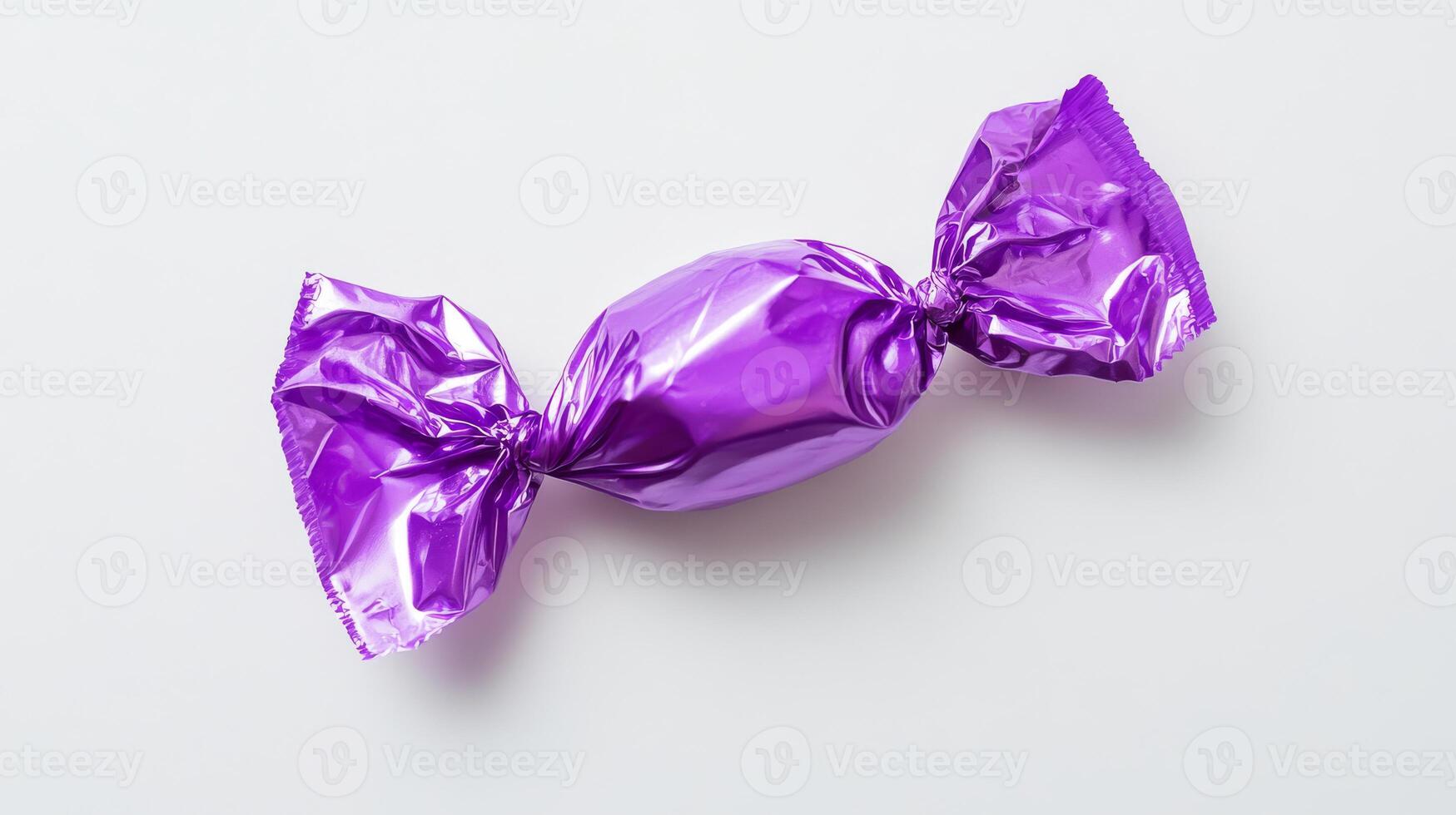 This shiny purple candy, wrapped in glossy foil, is a delightful treat for any sweet tooth. Ideal for sharing or savoring alone, it guarantees satisfaction with every scrumptious bite photo
