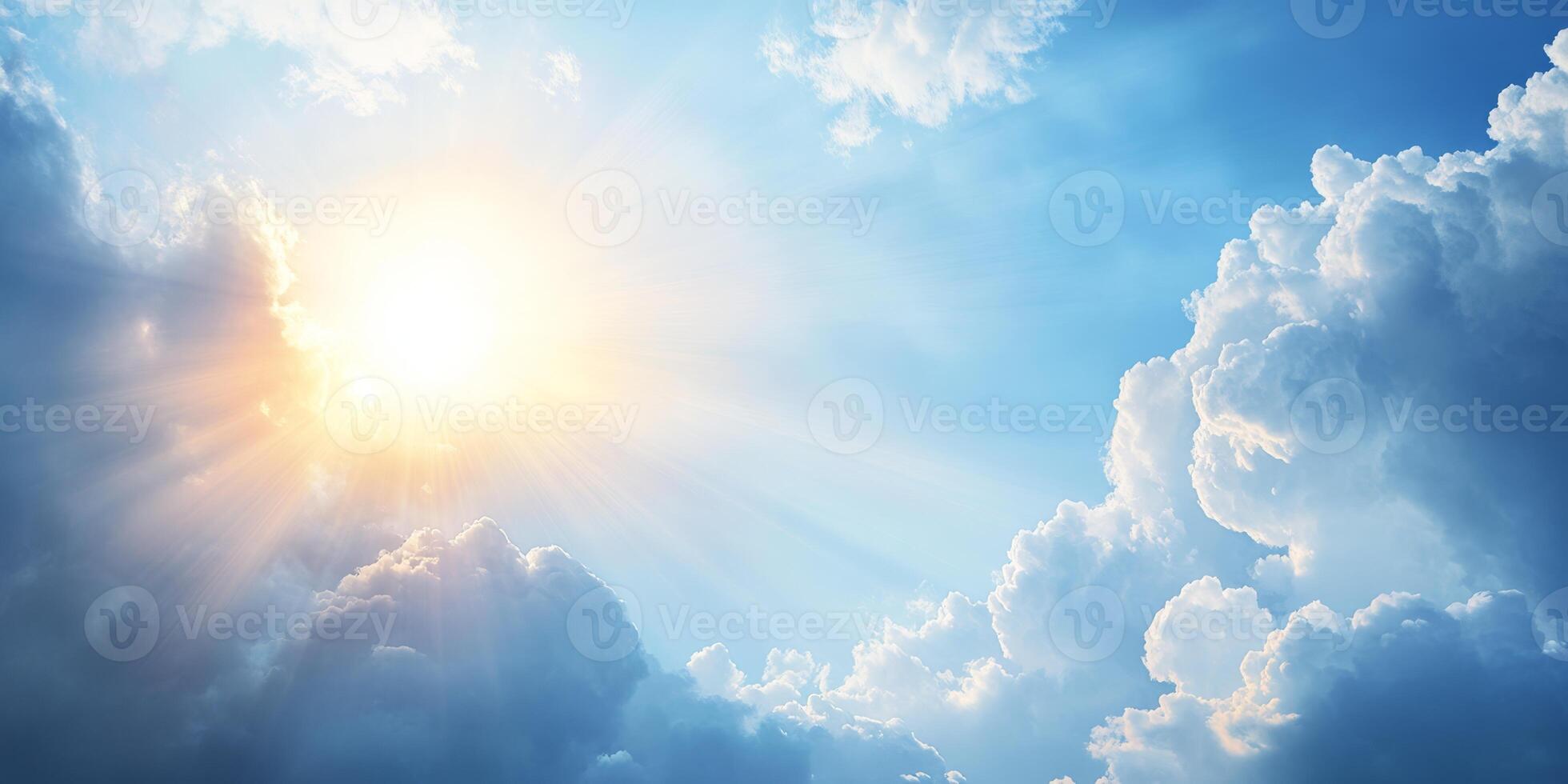 In a serene scene, the sun casts warm rays through soft clouds, creating a bright blue sky that evokes peace and natural beauty, captivating those who appreciate its charm and wonder photo